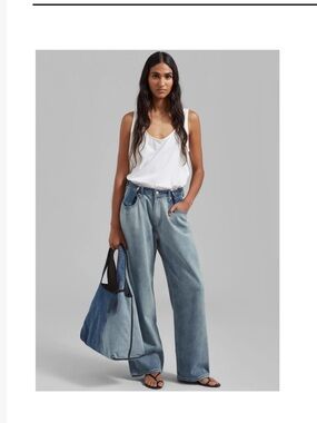 The Frankie Shop Relaxed Wide-Leg Washed Light Blue Jeans